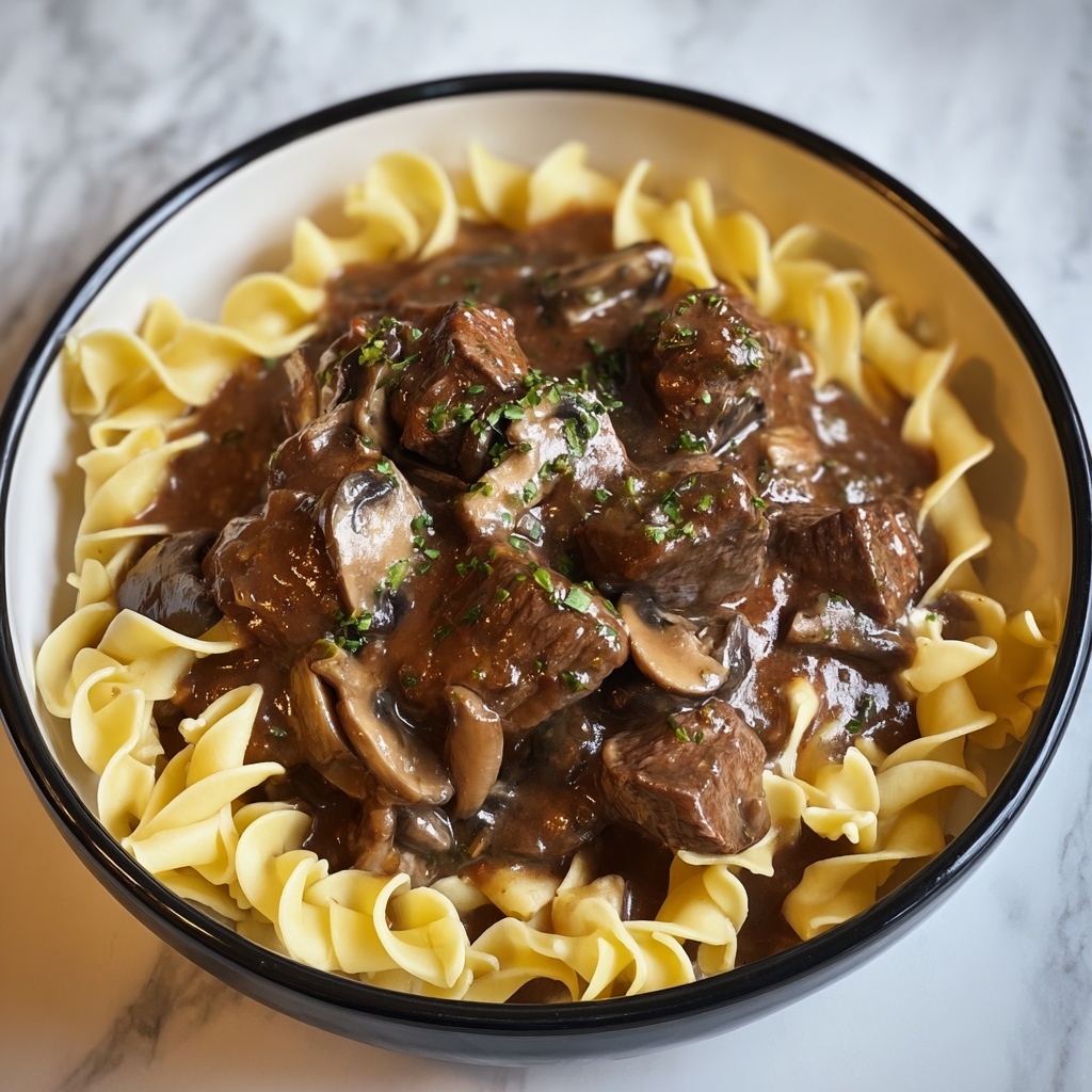 Tender Crockpot Beef Tips with Noodles Recipe - Recipe Image