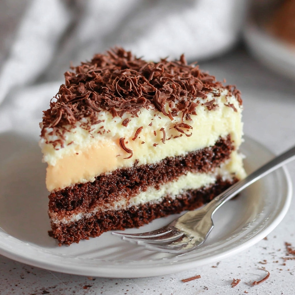 White German Chocolate Cake with a Cheesecake Center Recipe